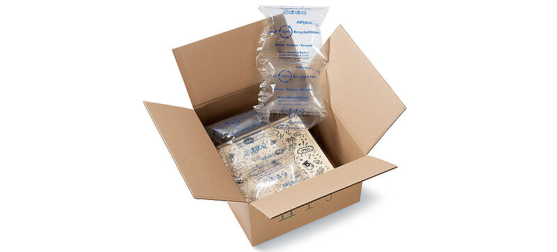A cardboard box with a box and 100% RECYCLED air cushions